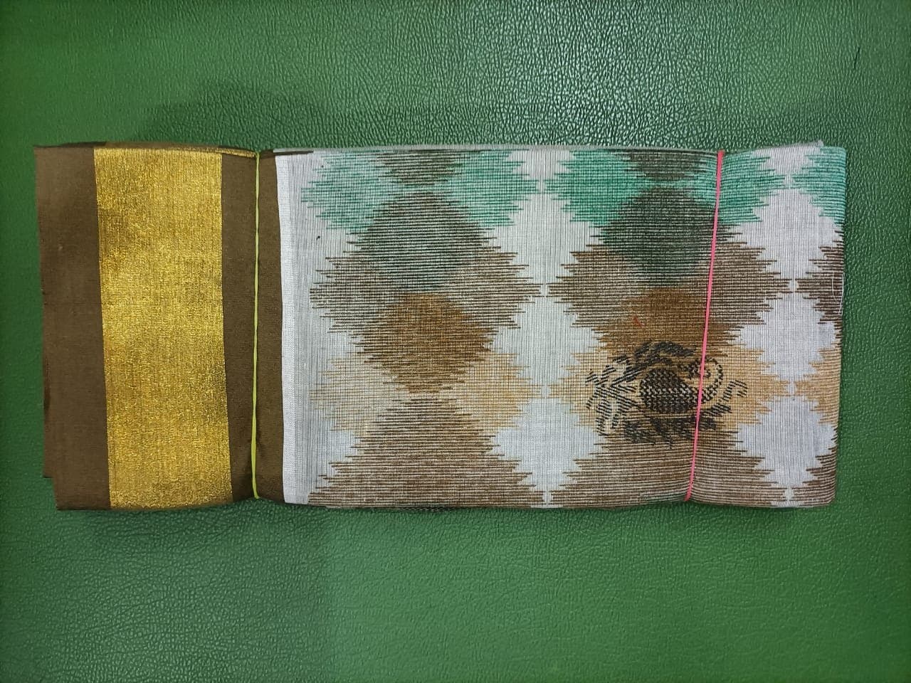 Beige Ikat Print Cotton Saree with Brown Zari Border